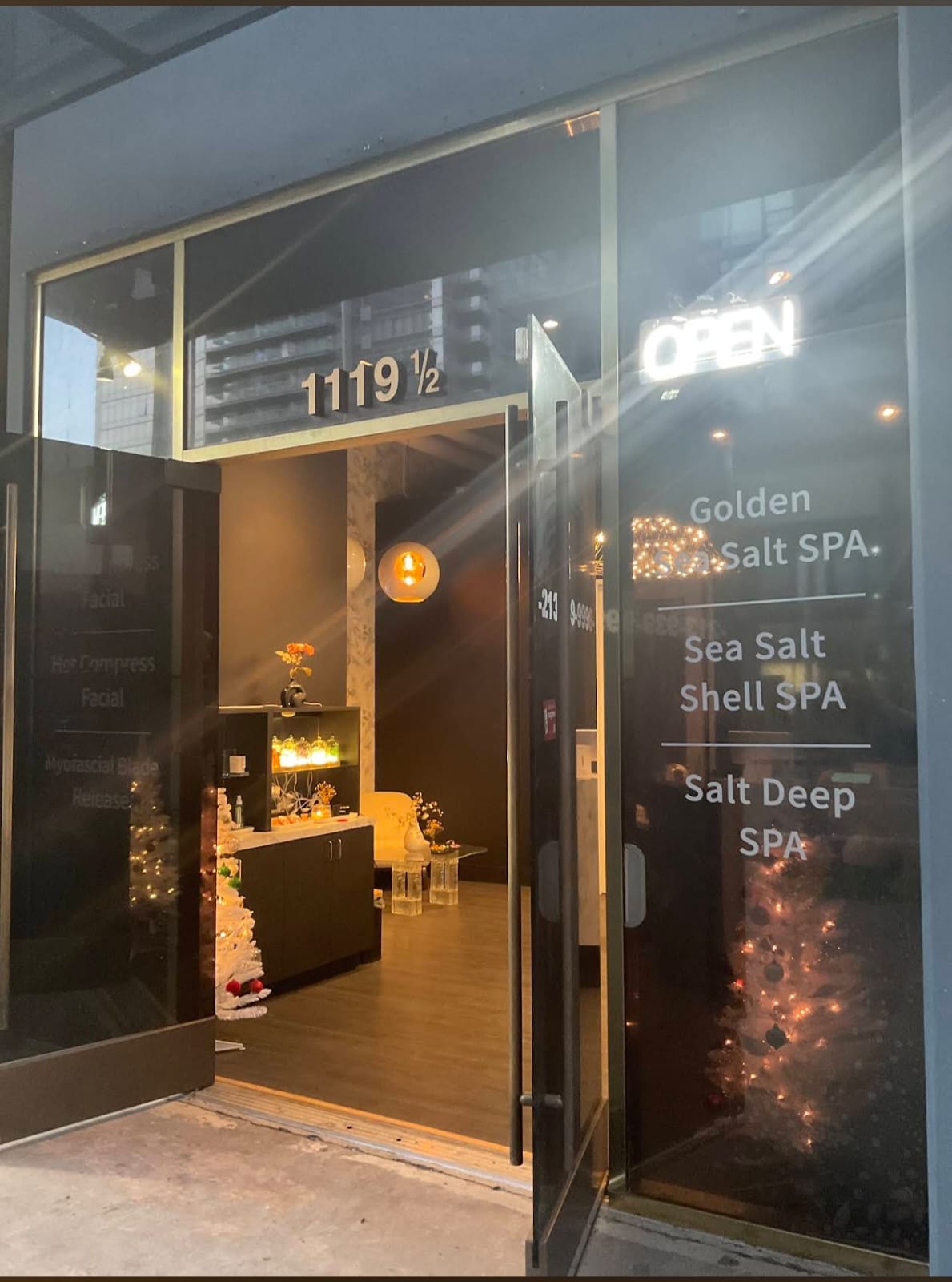 Luxe Luminary Spa storefront at night